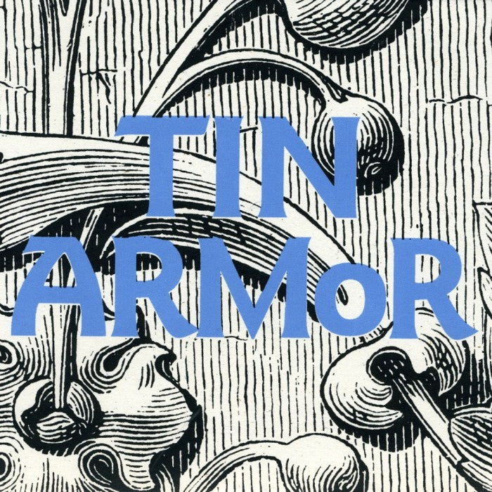 TIN ARMOR- "Strange and Estranging" 7"